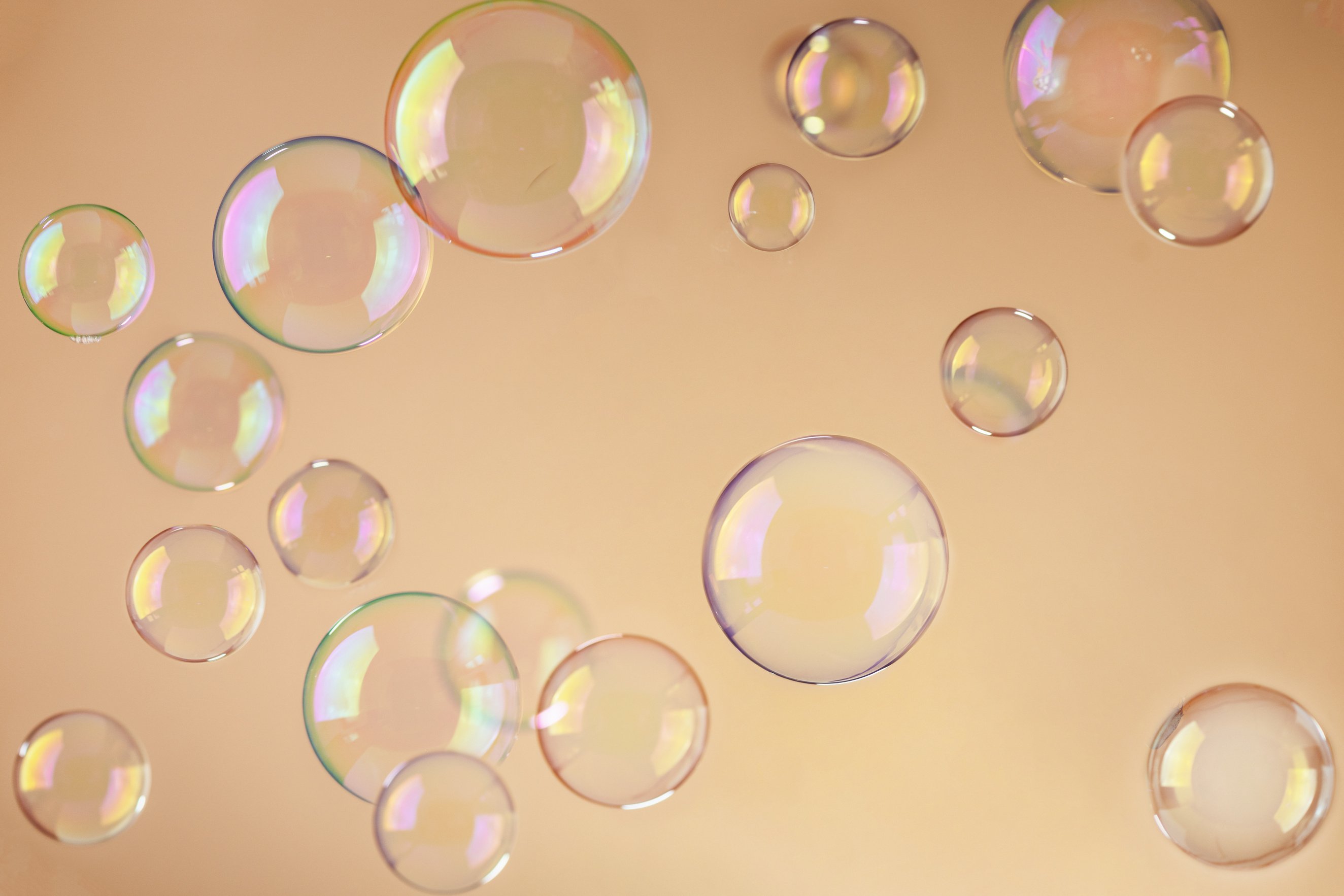 Abstract orange soap bubbles background. Orange soap bubbles wal